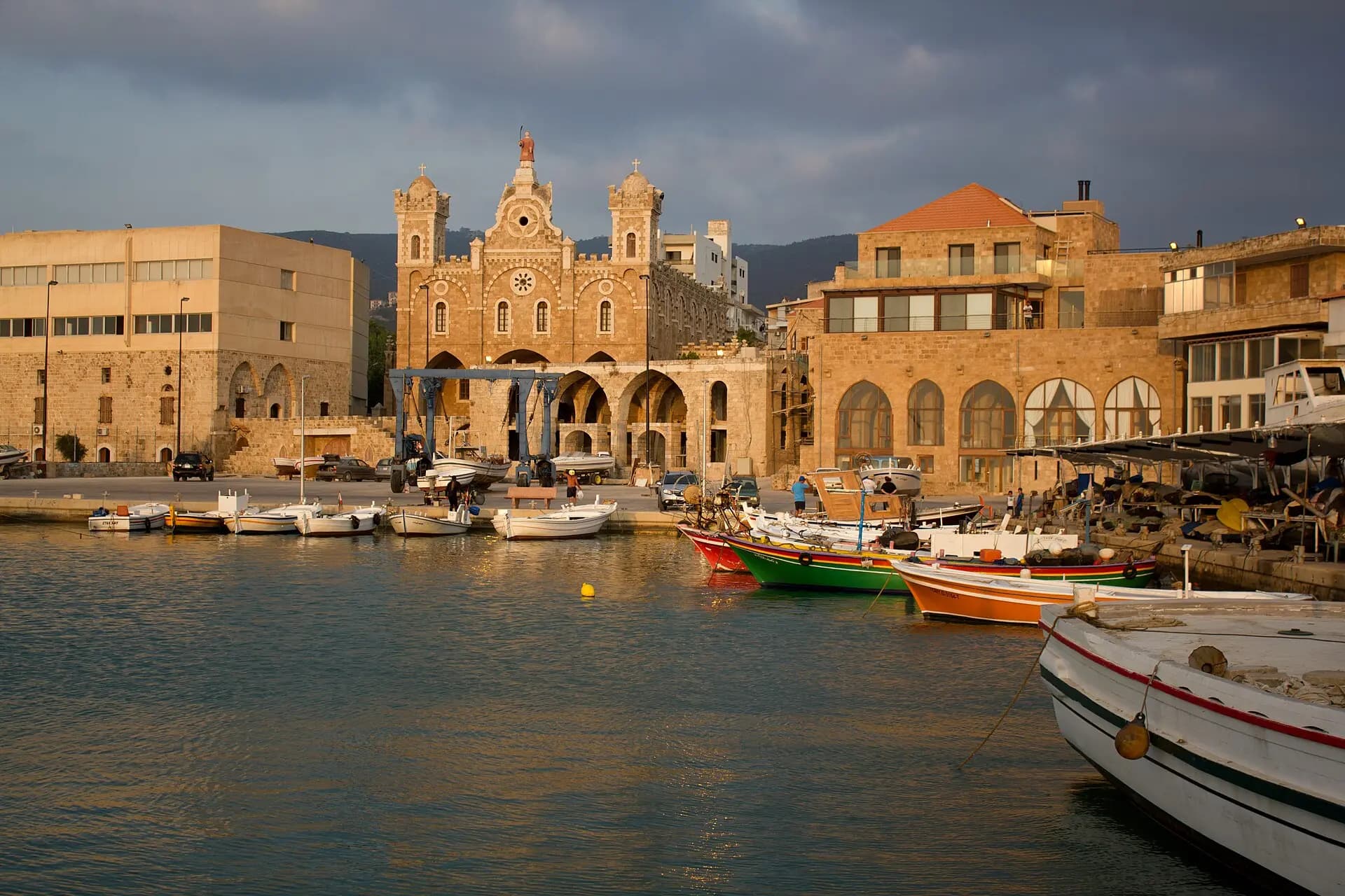 Batroun's old buildings beside clear Mediterranean water
