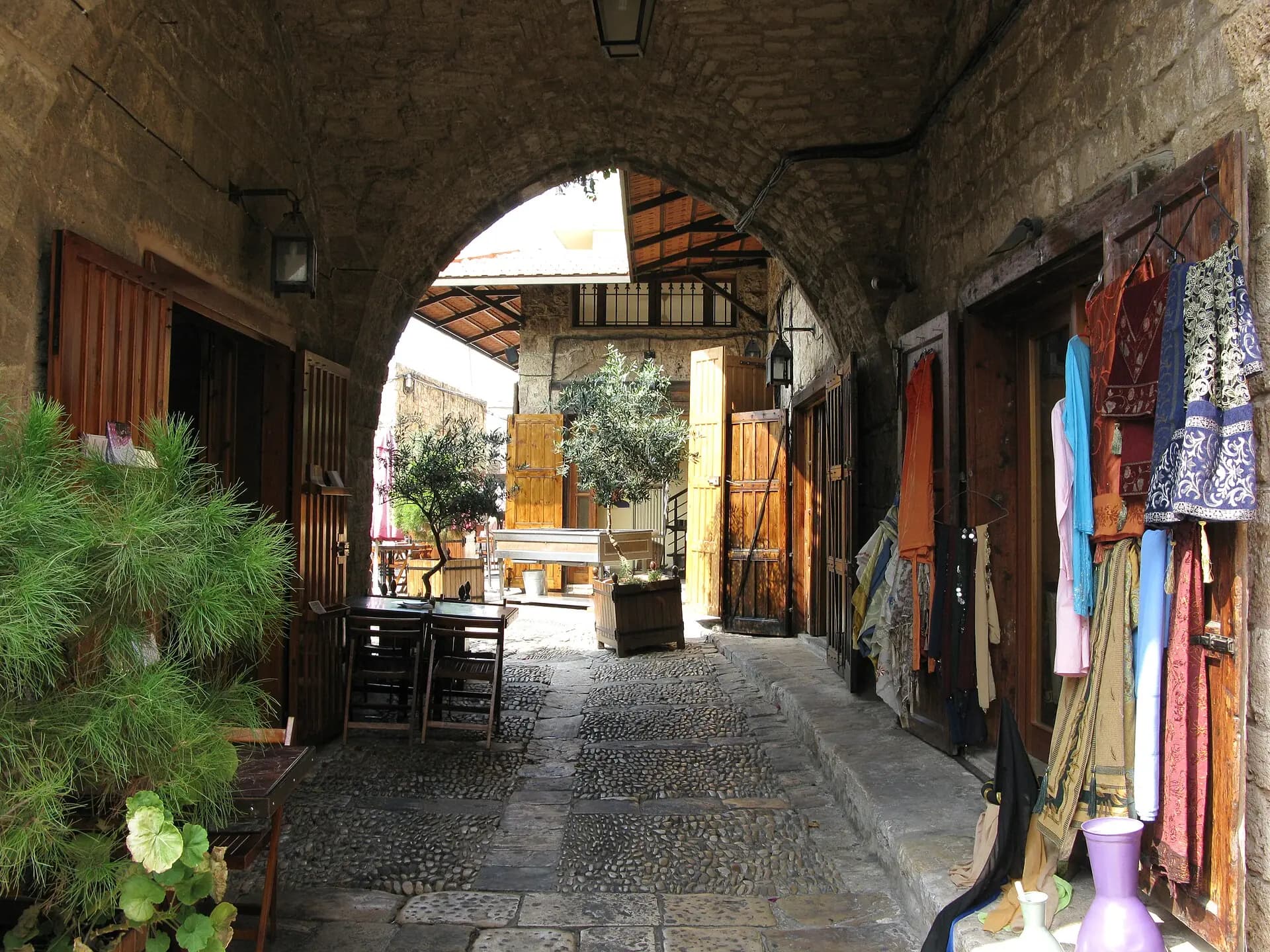 Arches and a stone lane in historic Byblos